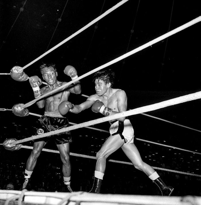 In researching Olivares (right, fighting Ernie Cruz in 1969), Yalen found a win that went forgotten.
